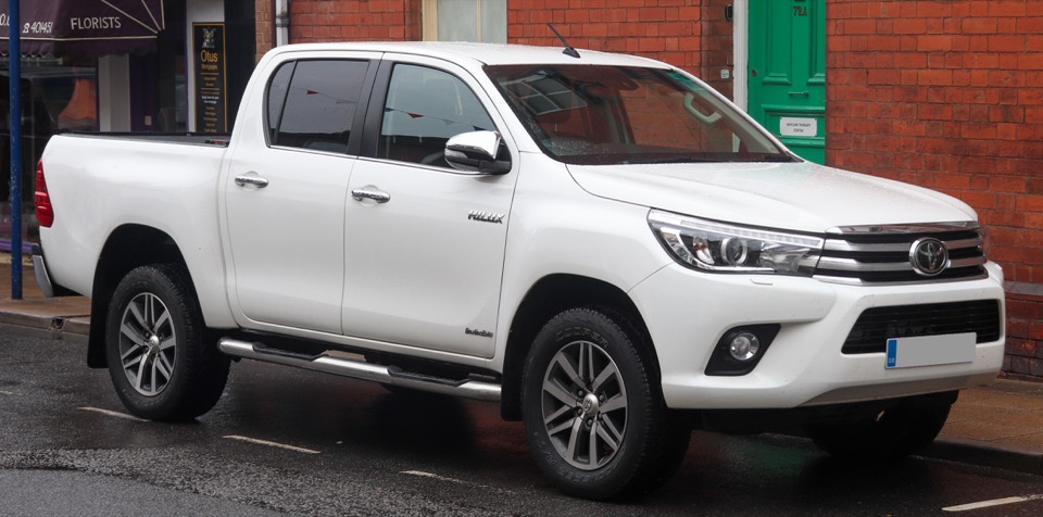 Stock photo of a Toyota Hilux Revo V, not the listed car