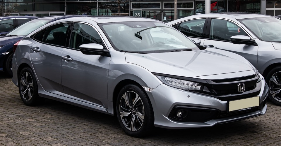 Stock photo of a Honda Civic Oriel, not the listed car