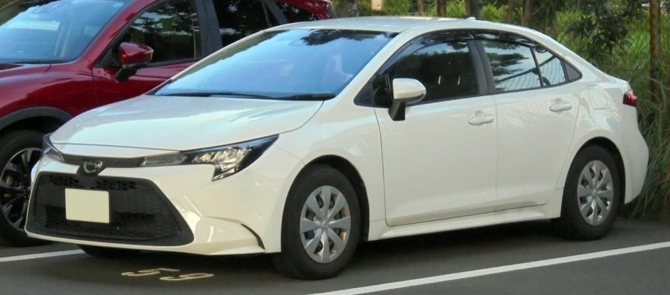 Stock photo of a Toyota Corolla Altis Grande, not the listed car
